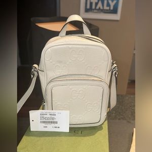 Gucci men’s Mini bag embossed GG white